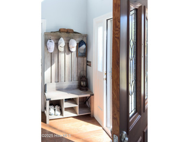 Discover this beautifully remodeled, brick traditional two-story on Oak Island Golf Club in North Carolina - for sale on GolfHomes.com, golf home, golf lot