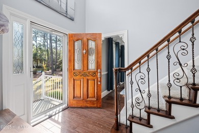 Discover this beautifully remodeled, brick traditional two-story on Oak Island Golf Club in North Carolina - for sale on GolfHomes.com, golf home, golf lot