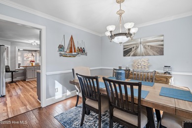 Discover this beautifully remodeled, brick traditional two-story on Oak Island Golf Club in North Carolina - for sale on GolfHomes.com, golf home, golf lot