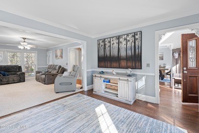 Discover this beautifully remodeled, brick traditional two-story on Oak Island Golf Club in North Carolina - for sale on GolfHomes.com, golf home, golf lot