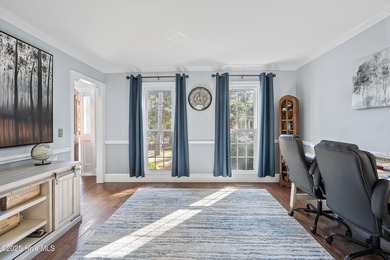 Discover this beautifully remodeled, brick traditional two-story on Oak Island Golf Club in North Carolina - for sale on GolfHomes.com, golf home, golf lot