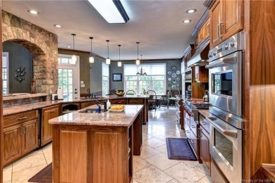 This extraordinary custom-built lakefront residence by renowned on Fords Colony Country Club in Virginia - for sale on GolfHomes.com, golf home, golf lot