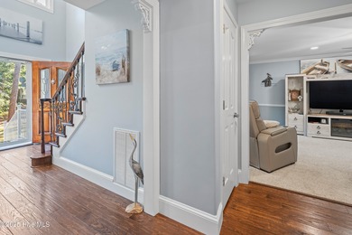 Discover this beautifully remodeled, brick traditional two-story on Oak Island Golf Club in North Carolina - for sale on GolfHomes.com, golf home, golf lot