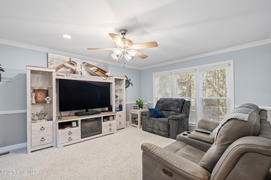 Discover this beautifully remodeled, brick traditional two-story on Oak Island Golf Club in North Carolina - for sale on GolfHomes.com, golf home, golf lot