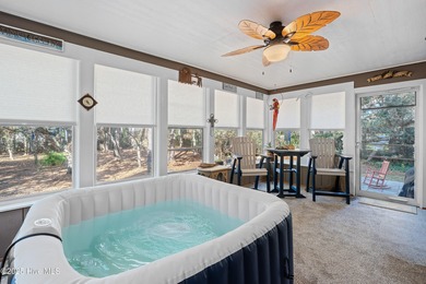 Discover this beautifully remodeled, brick traditional two-story on Oak Island Golf Club in North Carolina - for sale on GolfHomes.com, golf home, golf lot