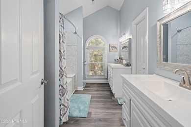 Discover this beautifully remodeled, brick traditional two-story on Oak Island Golf Club in North Carolina - for sale on GolfHomes.com, golf home, golf lot