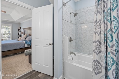 Discover this beautifully remodeled, brick traditional two-story on Oak Island Golf Club in North Carolina - for sale on GolfHomes.com, golf home, golf lot