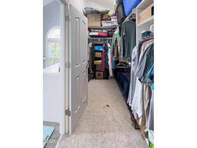 Discover this beautifully remodeled, brick traditional two-story on Oak Island Golf Club in North Carolina - for sale on GolfHomes.com, golf home, golf lot