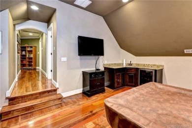 This extraordinary custom-built lakefront residence by renowned on Fords Colony Country Club in Virginia - for sale on GolfHomes.com, golf home, golf lot