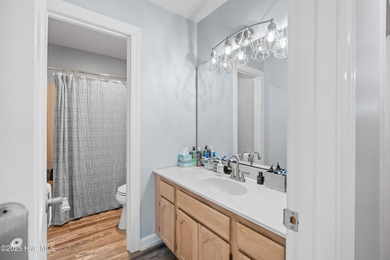 Discover this beautifully remodeled, brick traditional two-story on Oak Island Golf Club in North Carolina - for sale on GolfHomes.com, golf home, golf lot