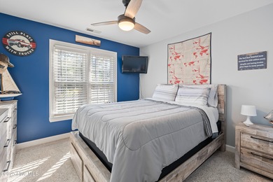 Discover this beautifully remodeled, brick traditional two-story on Oak Island Golf Club in North Carolina - for sale on GolfHomes.com, golf home, golf lot