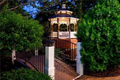 This extraordinary custom-built lakefront residence by renowned on Fords Colony Country Club in Virginia - for sale on GolfHomes.com, golf home, golf lot
