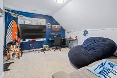 Discover this beautifully remodeled, brick traditional two-story on Oak Island Golf Club in North Carolina - for sale on GolfHomes.com, golf home, golf lot