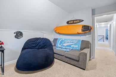 Discover this beautifully remodeled, brick traditional two-story on Oak Island Golf Club in North Carolina - for sale on GolfHomes.com, golf home, golf lot