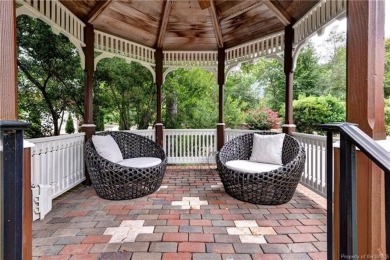 This extraordinary custom-built lakefront residence by renowned on Fords Colony Country Club in Virginia - for sale on GolfHomes.com, golf home, golf lot