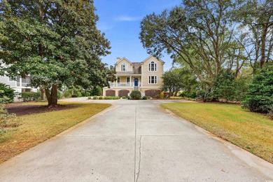 Set on a generous .44-acre homesite and positioned along one of on Pawleys Plantation Golf and Country Club in South Carolina - for sale on GolfHomes.com, golf home, golf lot