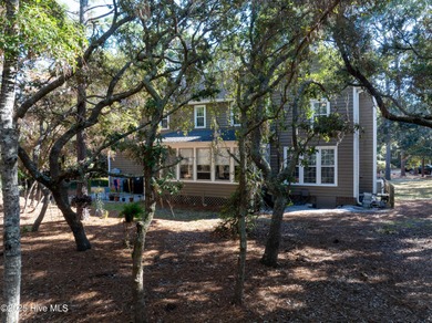 Discover this beautifully remodeled, brick traditional two-story on Oak Island Golf Club in North Carolina - for sale on GolfHomes.com, golf home, golf lot