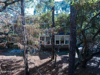 Discover this beautifully remodeled, brick traditional two-story on Oak Island Golf Club in North Carolina - for sale on GolfHomes.com, golf home, golf lot