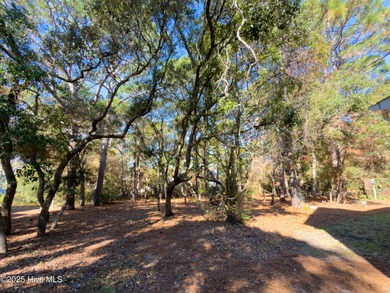 Discover this beautifully remodeled, brick traditional two-story on Oak Island Golf Club in North Carolina - for sale on GolfHomes.com, golf home, golf lot