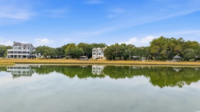 Set on a generous .44-acre homesite and positioned along one of on Pawleys Plantation Golf and Country Club in South Carolina - for sale on GolfHomes.com, golf home, golf lot