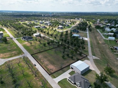 Experience luxury living at The Landings Airpark near Granbury on Pecan Plantation Country Club in Texas - for sale on GolfHomes.com, golf home, golf lot