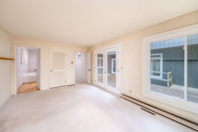 Enjoy breathtaking water views from this spacious 4-bedroom on St. Ives Golf Club in Michigan - for sale on GolfHomes.com, golf home, golf lot