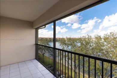 This beautifully updated 4th -floor condo offers stunning lake on Flamingo Lakes Country Club in Florida - for sale on GolfHomes.com, golf home, golf lot