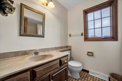 Welcome to this impeccably maintained two-story, all brick on Cantigny Golf and Tennis Club in Illinois - for sale on GolfHomes.com, golf home, golf lot