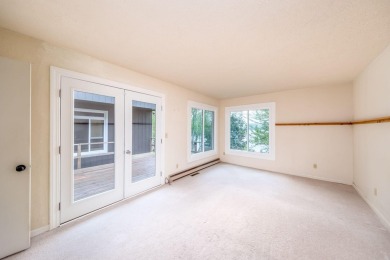 Enjoy breathtaking water views from this spacious 4-bedroom on St. Ives Golf Club in Michigan - for sale on GolfHomes.com, golf home, golf lot