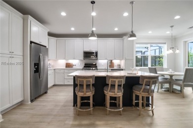 Enjoy beautiful serene sunrises from your lanai overlooking a on Tradition National Golf Club in South Carolina - for sale on GolfHomes.com, golf home, golf lot