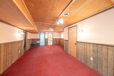 Enjoy breathtaking water views from this spacious 4-bedroom on St. Ives Golf Club in Michigan - for sale on GolfHomes.com, golf home, golf lot