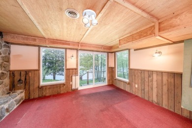Enjoy breathtaking water views from this spacious 4-bedroom on St. Ives Golf Club in Michigan - for sale on GolfHomes.com, golf home, golf lot