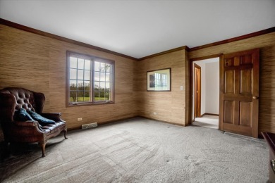 Welcome to this impeccably maintained two-story, all brick on Cantigny Golf and Tennis Club in Illinois - for sale on GolfHomes.com, golf home, golf lot