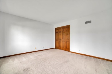 Welcome to this impeccably maintained two-story, all brick on Cantigny Golf and Tennis Club in Illinois - for sale on GolfHomes.com, golf home, golf lot