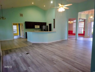 Located in a gated golf community, this brick-front 4-bed on Wachesaw Plantation East Golf Course in South Carolina - for sale on GolfHomes.com, golf home, golf lot