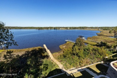 Stunning, waterfront, 3 BR/3BA home with captivating panoramic on Star Hill Golf Club  in North Carolina - for sale on GolfHomes.com, golf home, golf lot