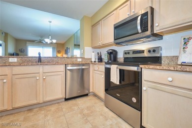 Stunning golf and water views from this 2nd floor 2 bedroom on Lexington Country Club in Florida - for sale on GolfHomes.com, golf home, golf lot
