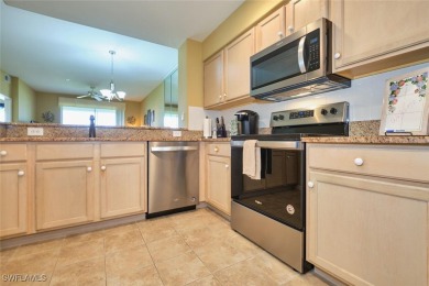 Stunning golf and water views from this 2nd floor 2 bedroom on Lexington Country Club in Florida - for sale on GolfHomes.com, golf home, golf lot