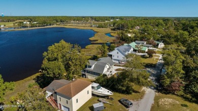 Stunning, waterfront, 3 BR/3BA home with captivating panoramic on Star Hill Golf Club  in North Carolina - for sale on GolfHomes.com, golf home, golf lot