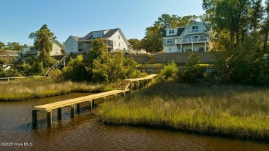 Stunning, waterfront, 3 BR/3BA home with captivating panoramic on Star Hill Golf Club  in North Carolina - for sale on GolfHomes.com, golf home, golf lot