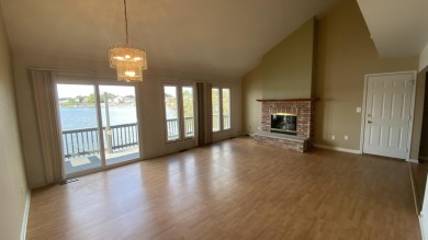 Welcome to resort-style living in the highly sought-after gated on Lakes of the Four Seasons Country Club in Indiana - for sale on GolfHomes.com, golf home, golf lot