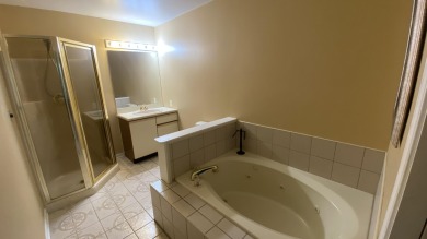 Welcome to resort-style living in the highly sought-after gated on Lakes of the Four Seasons Country Club in Indiana - for sale on GolfHomes.com, golf home, golf lot