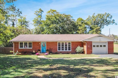 Adorable 3 bedroom home located on a large corner lot within on Mayfield-Graves Country Club in Kentucky - for sale on GolfHomes.com, golf home, golf lot