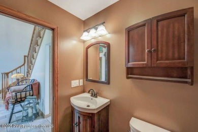 Life at the lake is a little different. Henry David Thoreau once on Elkview Country Club in Pennsylvania - for sale on GolfHomes.com, golf home, golf lot