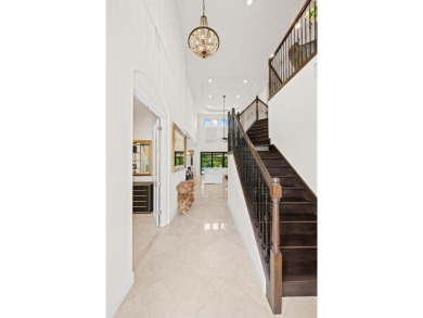 Parkland Golf and Country Club Saviero model feat 5 beds and 4 on Parkland Golf Club in Florida - for sale on GolfHomes.com, golf home, golf lot