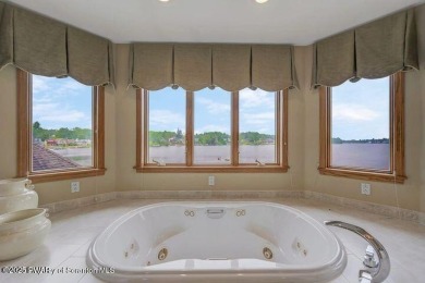 Life at the lake is a little different. Henry David Thoreau once on Elkview Country Club in Pennsylvania - for sale on GolfHomes.com, golf home, golf lot