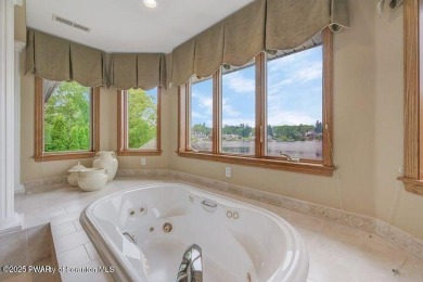 Life at the lake is a little different. Henry David Thoreau once on Elkview Country Club in Pennsylvania - for sale on GolfHomes.com, golf home, golf lot