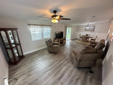 This beautifully remodeled Palm Harbor stucco home is a on Del Tura Golf and Country Club in Florida - for sale on GolfHomes.com, golf home, golf lot