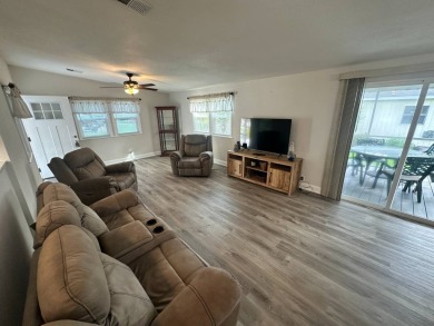 This beautifully remodeled Palm Harbor stucco home is a on Del Tura Golf and Country Club in Florida - for sale on GolfHomes.com, golf home, golf lot