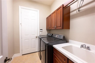 Immaculately maintained pool home which overlooks the lake on a on Lely Resort Golf and Country Club in Florida - for sale on GolfHomes.com, golf home, golf lot